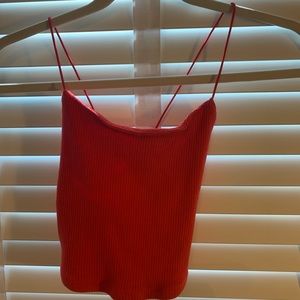 Red ribbed tank top with crossed back